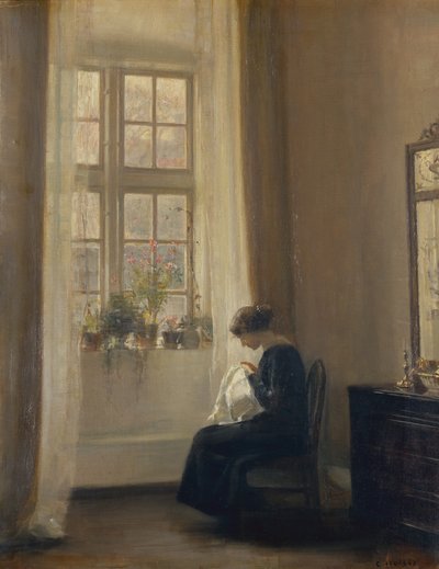Ein Mädchen näht in einem Innenraum von Carl Holsoe