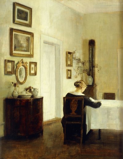 Eine Frau an einem Tisch in einem Innenraum von Carl Holsoe
