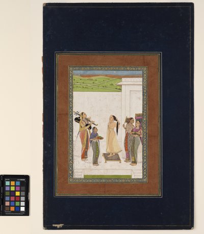 Eine Frau, die ihre Toilette vervollständigt von Deccani School