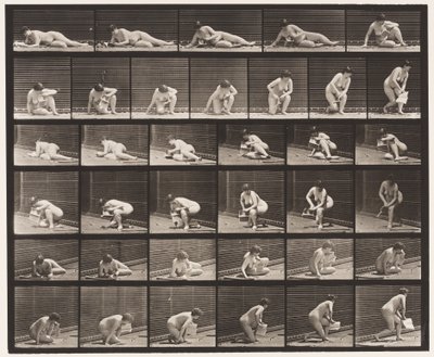 Vom Boden aufstehen mit Pamphlet in der linken Hand von Eadweard Muybridge