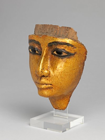 Gesicht von einem Sarg, mit eingelegten Augen und Augenbrauen, vergoldet von Egyptian 20th Dynasty