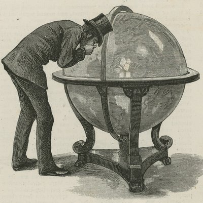 Ein Mann von Lloyds studiert einen Globus von English School