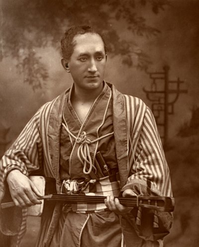 Durward Lely, schottischer Opernsänger, in Gilbert und Sullivans The Mikado von Ernest Barraud
