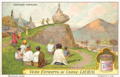 Siam-Buddhisten beten an einem Schrein mit Balancierstein von European School