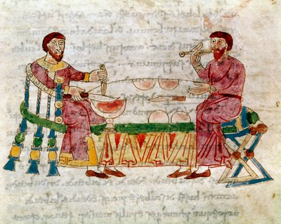 Zwei Männer bei einer Mahlzeit aus dem Band „De Mensis et Escis“, Manuskript „De Universo“ (oder De rerum naturis (Über die Natur der Dinge)) (cod. 132) von Rabanus Maurus Magnentius (ca. 780-856). 9. Jahrhundert. Archiv von German School