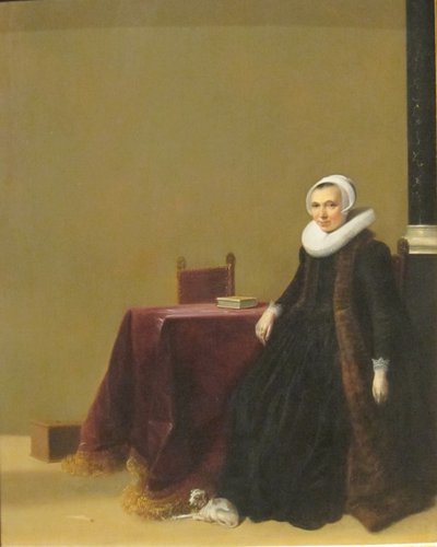Porträt einer Frau mit einem Hund von Hendrik Gerritsz Pot