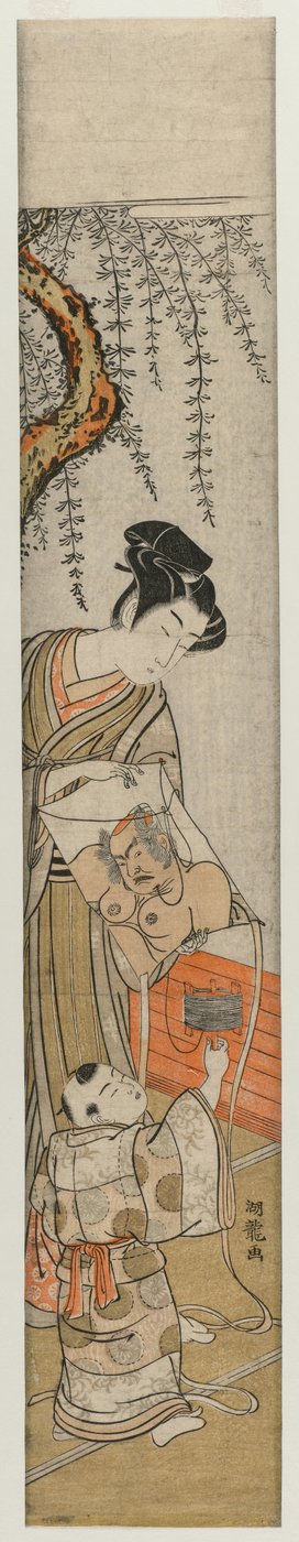 Junger Mann und Kind mit einem Drachen von Isoda Koryusai
