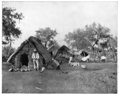 Strohhütten, Salamanca, Mexiko von John L. Stoddard
