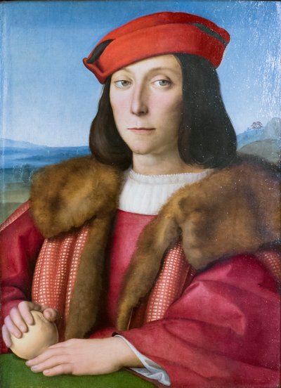 Porträt eines jungen Mannes mit einem Apfel, möglicherweise Francesco Maria della Rovere, um 1505 von Raphael (1483 1520)