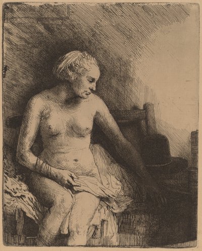Frau beim Bad mit einem Hut neben ihr von Rembrandt van Rijn