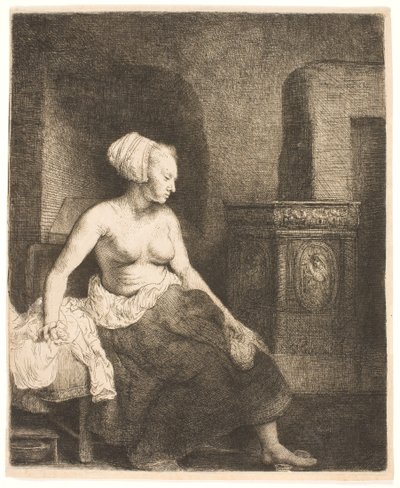 Frau sitzt halb angezogen neben einem Ofen von Rembrandt van Rijn
