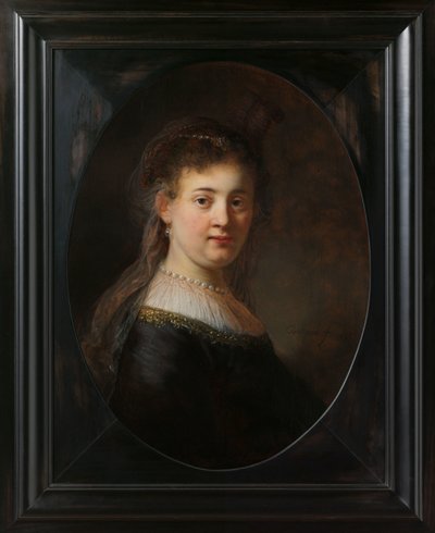 Junge Frau in Fantasiekostüm von Rembrandt van Rijn