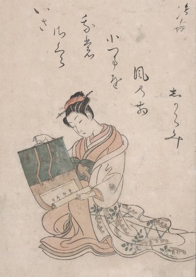 Schönheit, die eine Schriftrolle entrollt, ca. 1770 von Suzuki Harunobu