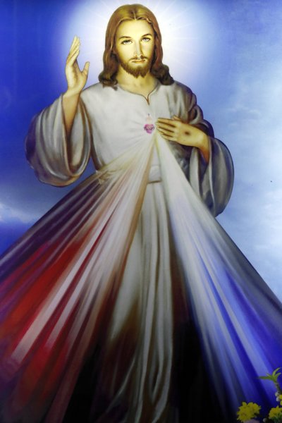 Laden, der religiöse christliche Artikel verkauft. Barmherziger Jesus, ich vertraue auf dich. Ho-Chi-Minh-Stadt. Vietnam von Unbekannt