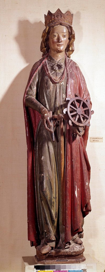 Darstellung der heiligen Katharina von Alexandria, die das Rad ihres Martyriums hält. Polychrome Holzstatue von Unknown artist