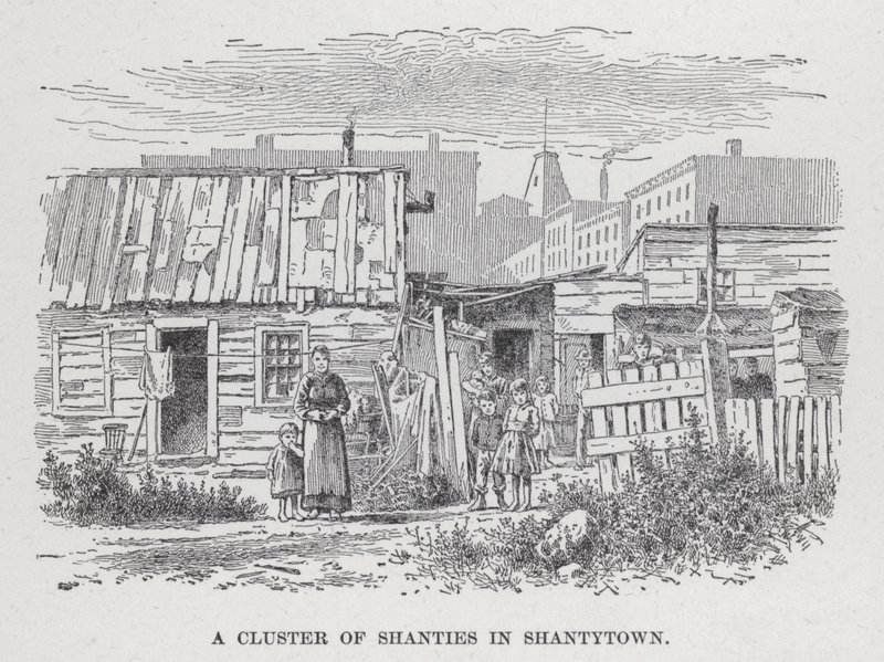 Eine Ansammlung von Hütten in Shantytown von American School