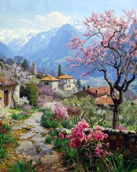 Ein schönes Dorf umgeben von blühenden Pflanzen in einer bergigen Landschaft