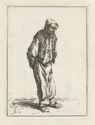 Stehender Bauer mit den Händen auf dem Rücken