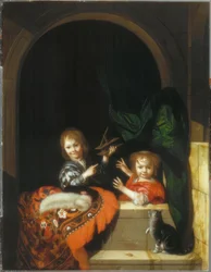 Zwei Kinder mit einer Mausefalle