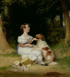 Ein junges Mädchen mit ihrem Spaniel