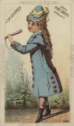 Mädchen im blauen Mantel und Stiefeln