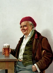 Alter Mann mit einem Bier in einer Kneipe
