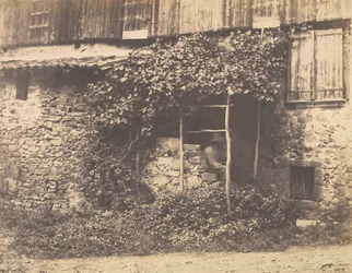 [Rustikales Gebäude mit Mann unter Laube], ca. 1853