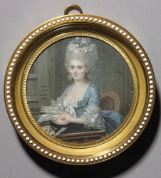 Porträt einer Frau in einem blauen Kleid