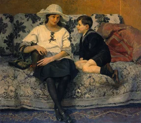 Ein junges Mädchen und ein junger Junge auf einem Sofa