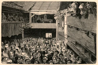 Feier des katholischen Gottesdienstes in Porrentruy, Schweiz im Jahr 1874, nach einer Fotografie. Gravur in „Les Missions Catholiques au XIXème Siècle“ von Louis-Eugène Louvet. Private Sammlung.