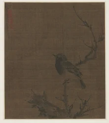 Schlafender Vogel auf einem Prunuszweig