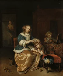 Interieur mit einer Mutter, die das Haar ihres Kindes kämmt, bekannt als 