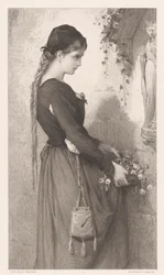 Junge Frau bringt Blumen zu einer Nische mit Marienbild