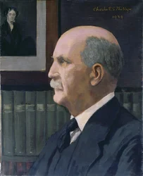 William Henry Bragg (1862-1942) mit einem Bild von Michael Faraday (1791-1867) im Hintergrund, 1939