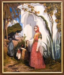 Orientalische Frau am Brunnen