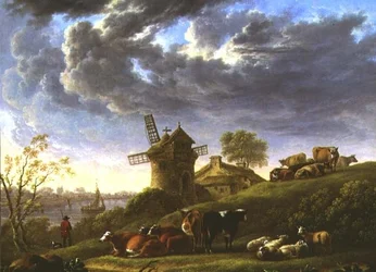 Sonnenbeschienene Weiden bei einem Dorf am Fluss