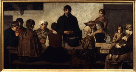 Benedicite Familie betet am Tisch