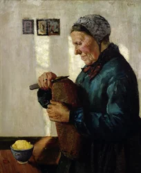 Frau schneidet Brot