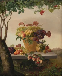 Ein Korb mit Früchten in einer Landschaft