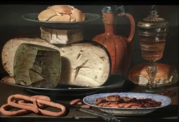 Stillleben mit Käse, Mandeln und Brezeln