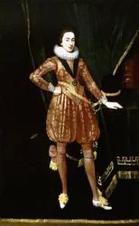 Ganzfiguriges Porträt König Karls I. als Prinz von Wales vor einem grünen Samtvorhang, mit dem Orden des Heiligen Georg, einem goldbestickten Wams und Kniehosen, die linke Hand neben seinem Hut auf einen Tisch gestützt