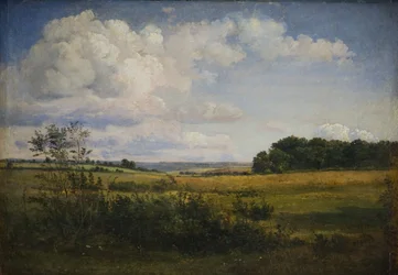 Landschaft mit sonnenbeschienenen Wolken
