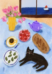 Entspannendes Frühstück am Meer mit Katze