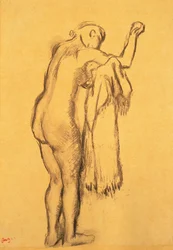 Badende, die sich abtrocknet