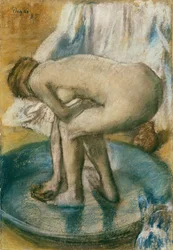Frau badet in einer flachen Wanne, 1885