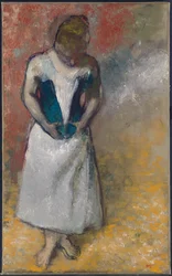 Frau steht von vorne, schnürt ihr Korsett, 1883