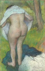 Junge Frau beim Ankleiden