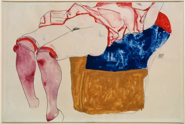 Liegendes Mädchen mit violetten Strümpfen