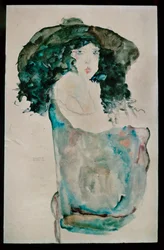 Mädchen mit blauschwarzem Haar und Hut
