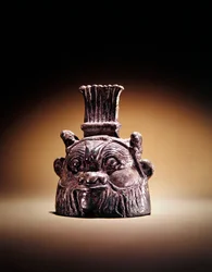 Glocke in Form von Bes